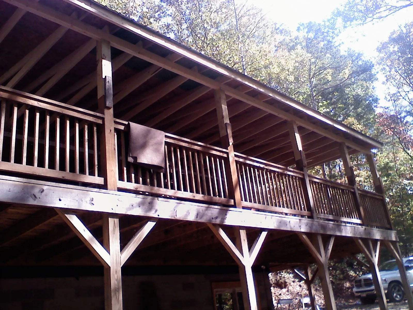Timber framing under a new elevated porch and deck — Roof Leak Repair in West Alexander by Roofing Brothers